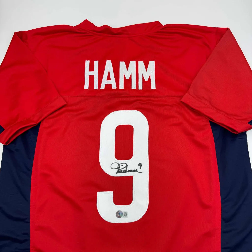 Red and navy blue Mia Hamm signed custom jersey, perfect sports memorabilia for fans