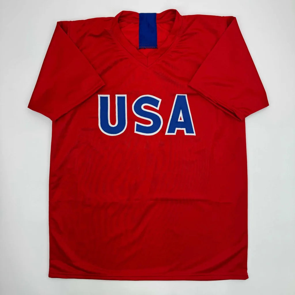 Autographed Mia Hamm red USA custom jersey with blue lettering, professional sports