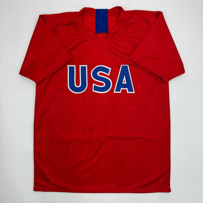 Autographed Mia Hamm red USA custom jersey with blue lettering, professional sports