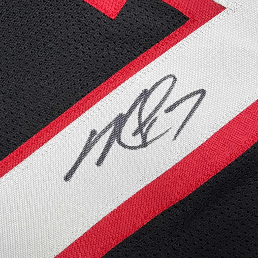 Autographed Michael Vick Atlanta black custom jersey with red accents, Beckett COA