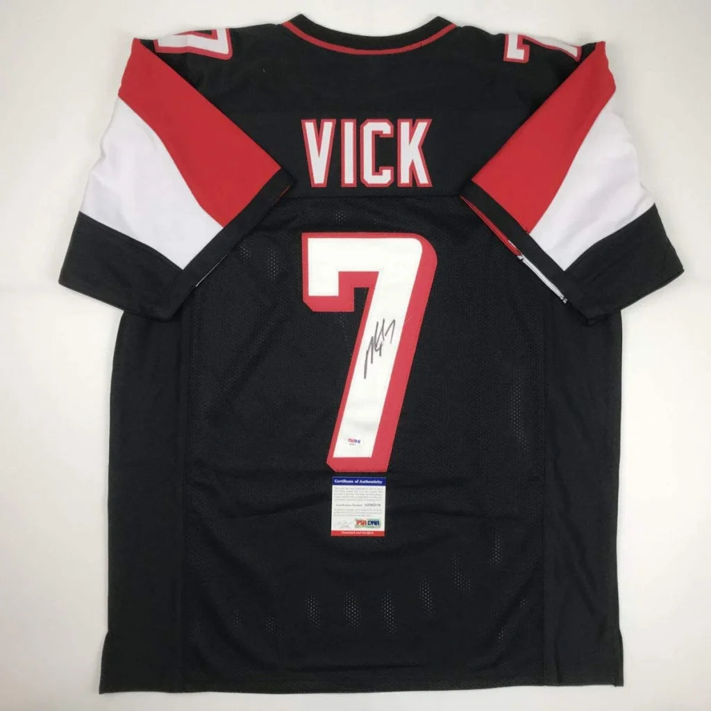 Black custom jersey with red and white accents signed by Vick number 7 for sports league fans