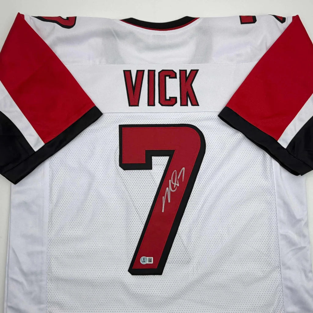 Autographed Michael Vick Atlanta white custom jersey with Vick 7, professional sports