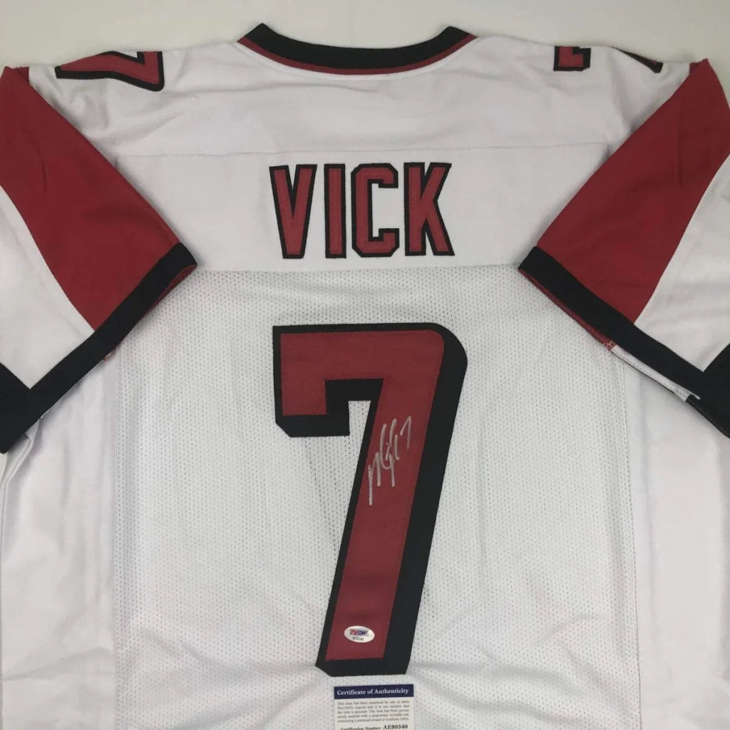 Autographed Michael Vick No 7 football jersey with certificate of authenticity for sports fans