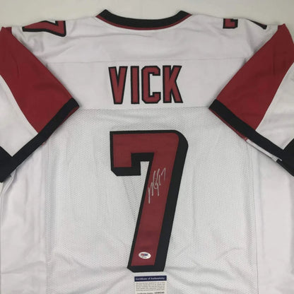 Autographed Michael Vick No 7 football jersey with certificate of authenticity for sports fans