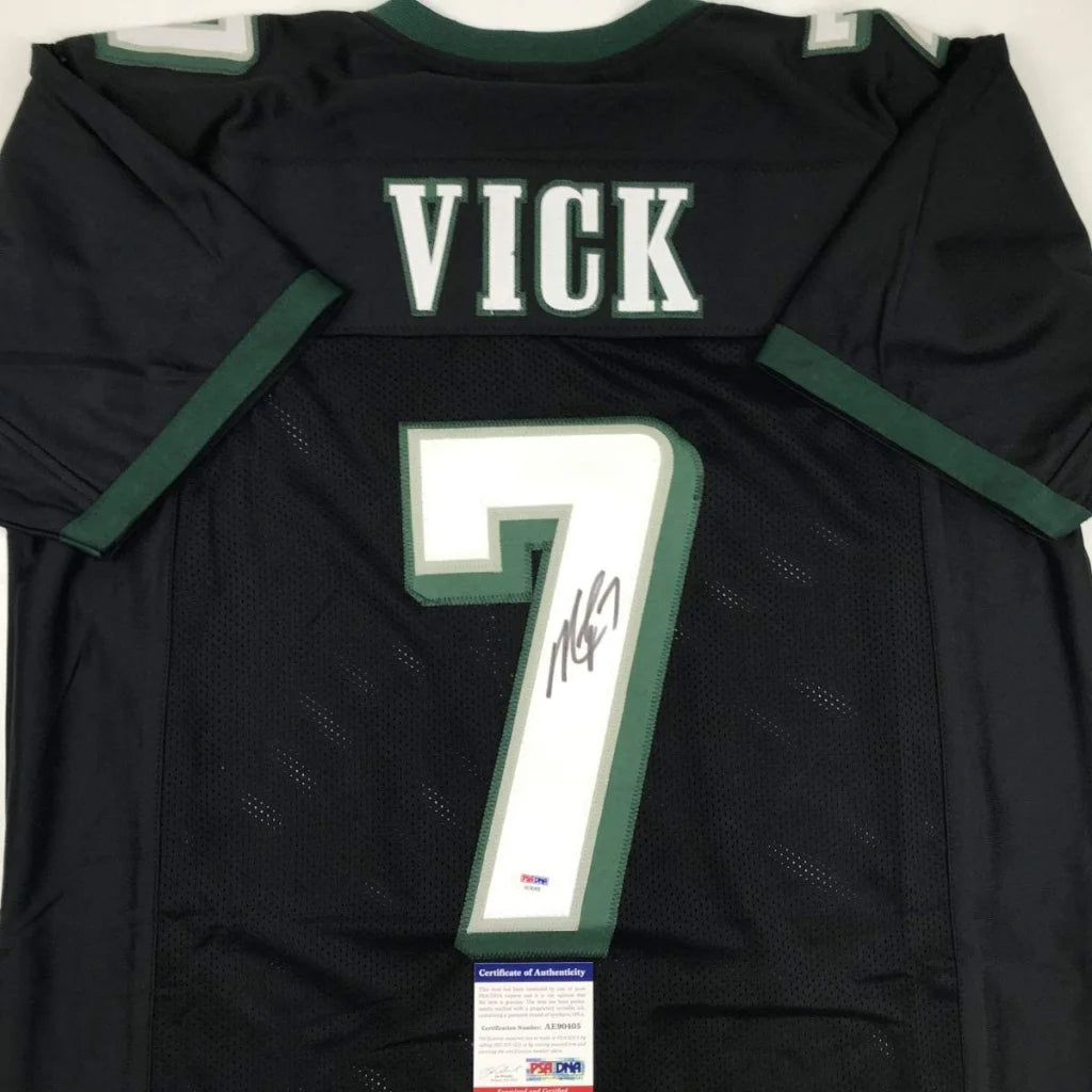 Black Michael Vick pro sports league jersey with autograph and certificate of authenticity