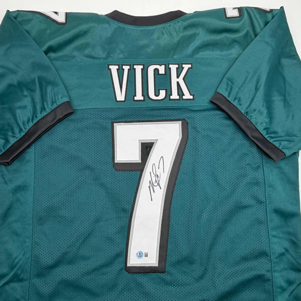 Autographed Michael Vick Philadelphia Green Football Jersey Beckett BAS COA | Certified Authentic Signed Memorabilia | vintageantiquesgifts.com