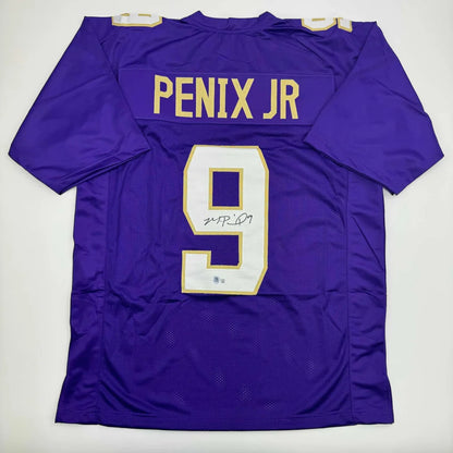 Back of a purple autographed michael penix jr washington huskies custom jersey with gold lettering number 9 for professional sports league fans