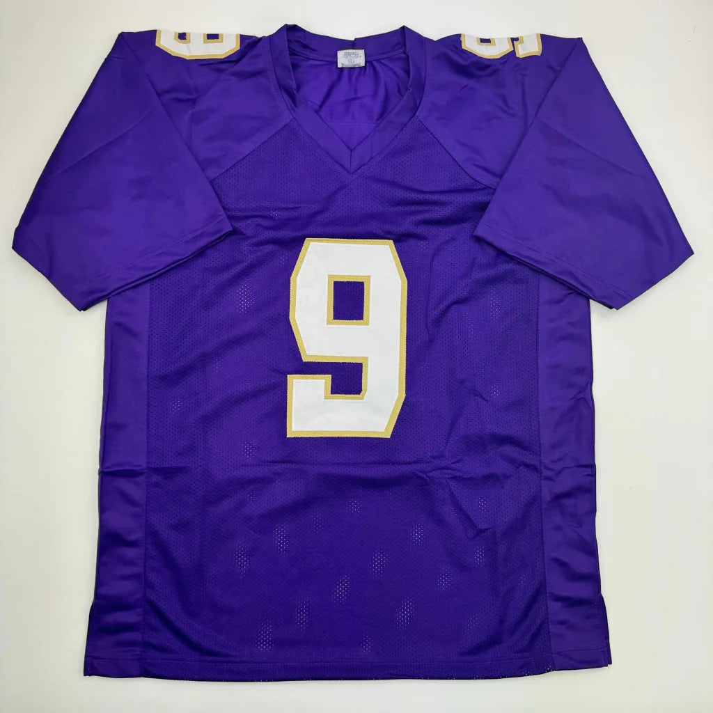 Autographed michael penix jr custom purple football jersey with white gold number 9 mesh fabric and shoulder patches professional sports league