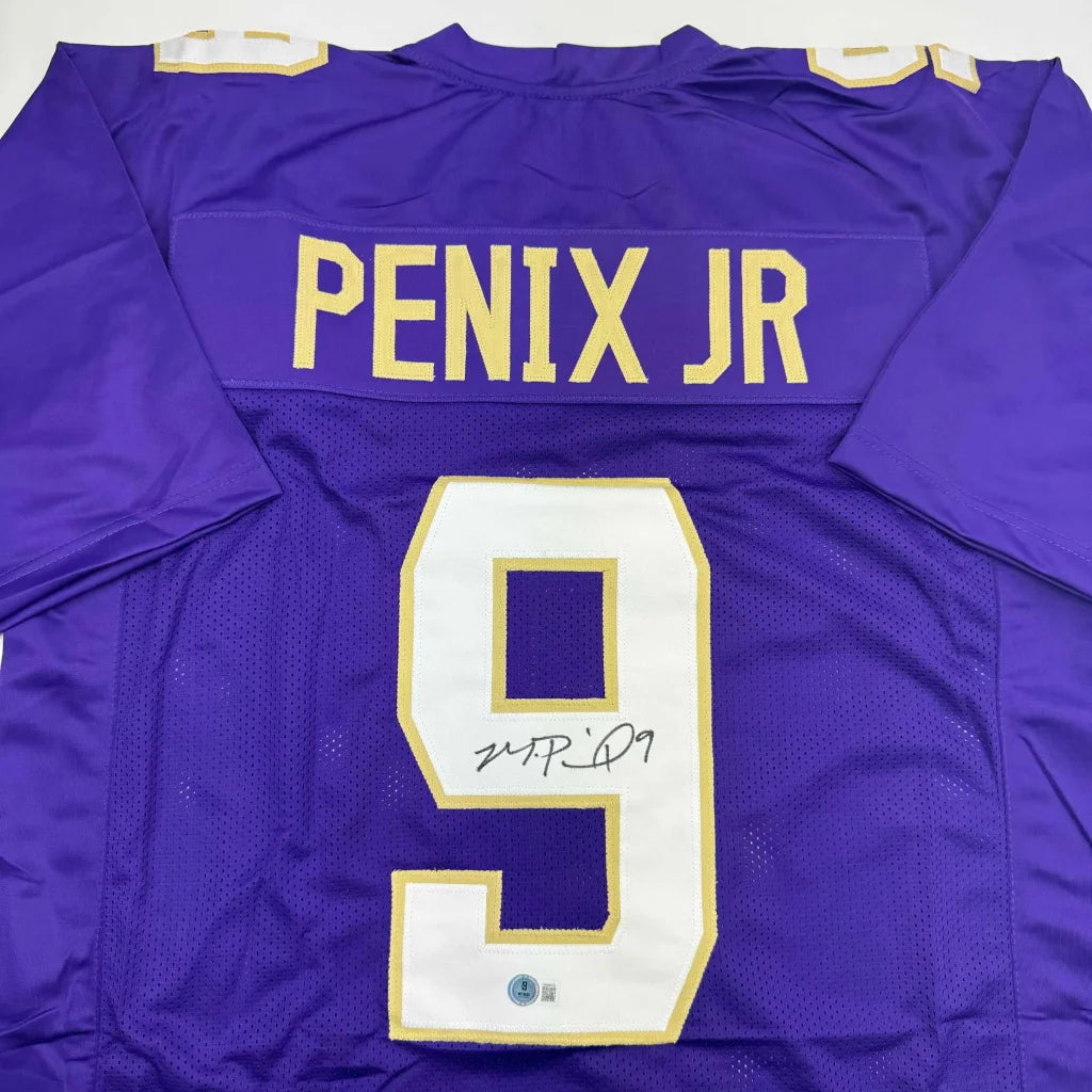 Back of a purple custom jersey featuring penix jr number 9 from the professional sports league washington huskies