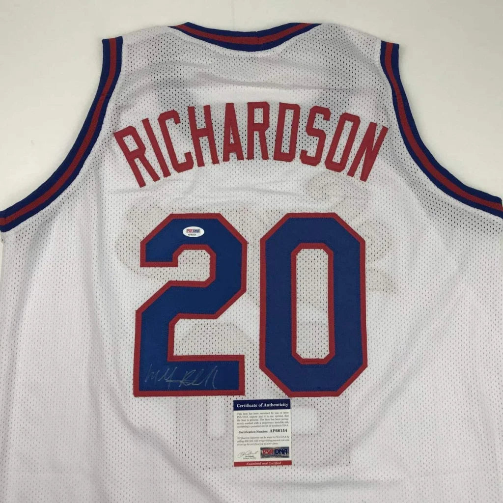 Back of a white mesh custom basketball jersey with red and blue lettering richardson 20 for professional sports league