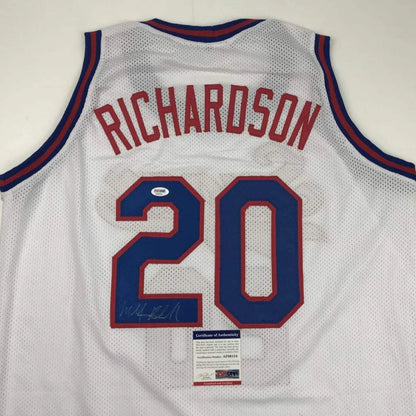 Back of a white mesh custom basketball jersey with red and blue lettering richardson 20 for professional sports league