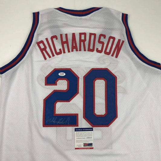 Back of a white mesh custom basketball jersey with red and blue lettering richardson 20 for professional sports league
