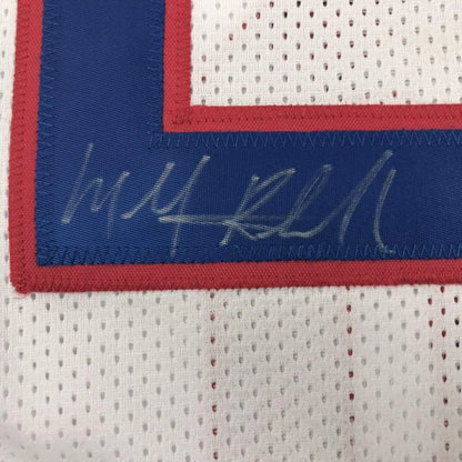 Autographed Micheal Ray Richardson white mesh custom jersey with red blue trim and silver signature for professional sports league