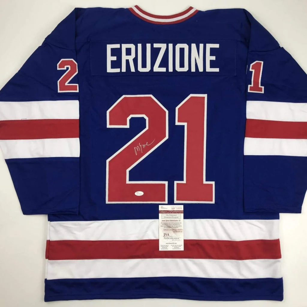 Back of blue custom hockey jersey with red and white stripes featuring eruzione 21 for professional sports league use