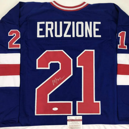 Royal blue custom jersey with red and white stripes featuring eruzione 21 signed for professional sports collectors