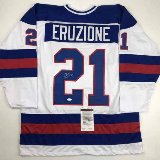 White hockey jersey with blue and red stripes featuring eruzione 21 in bold navy outlined in red back side custom jersey