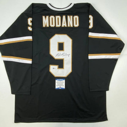 Autographed Black Mike Modano Dallas jersey from professional sports league