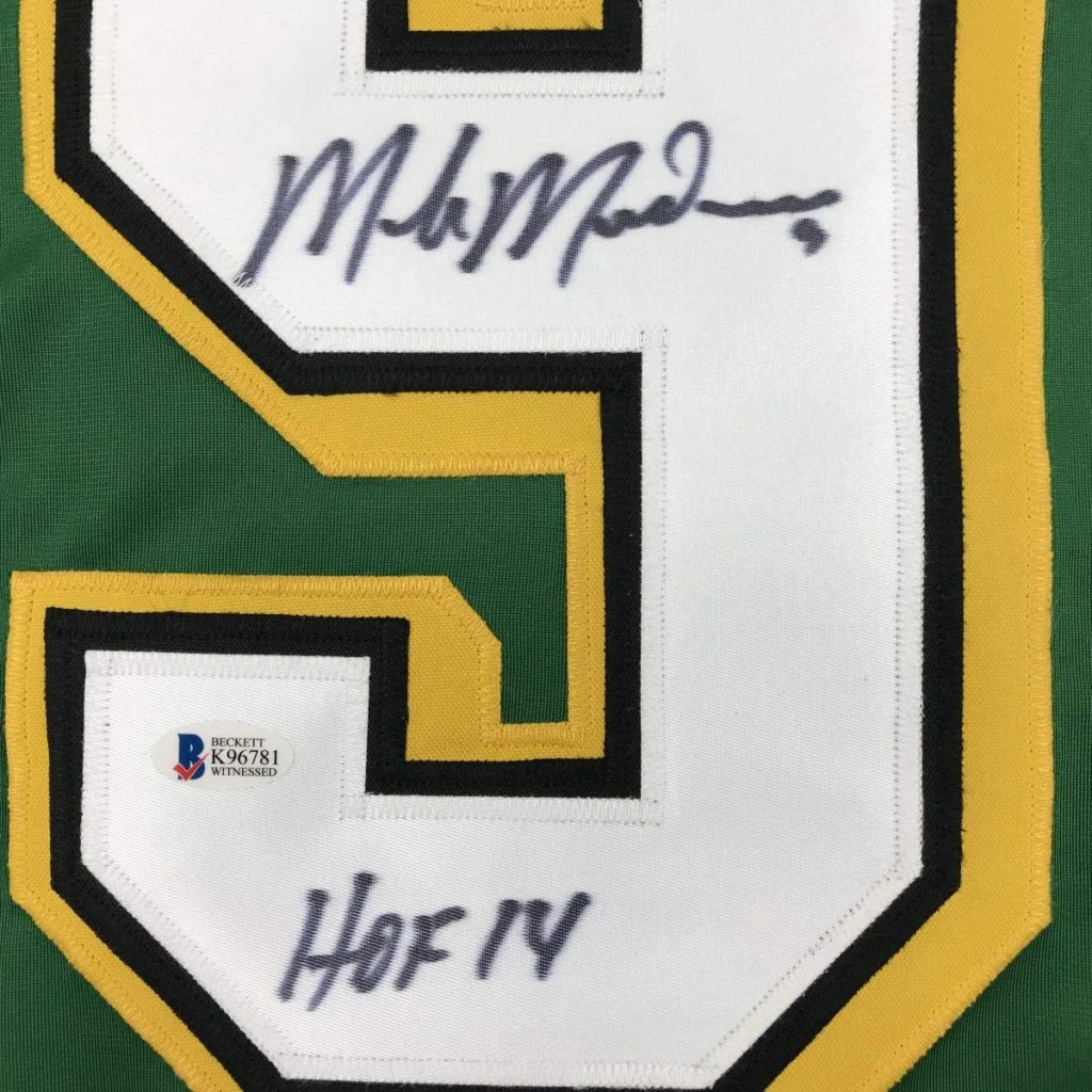 Back of autographed Mike Modano custom professional sports jersey number 5