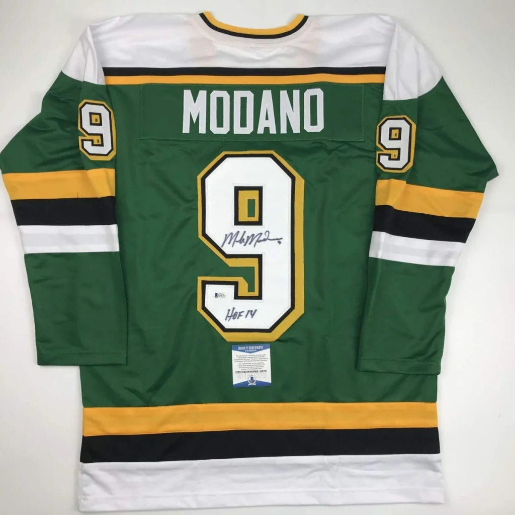 Back of autographed Mike Modano custom green jersey, number 9, professional sports league