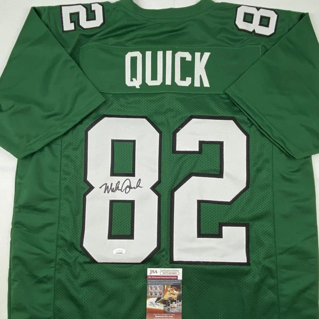 Back of a kelly green mike quick custom jersey with white number 82 and signature for professional sports league