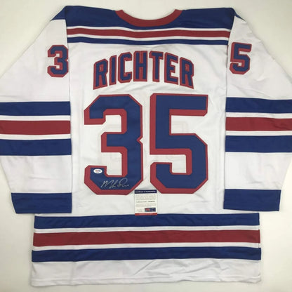 Custom Mike Richter jersey with 35, PSA DNA authenticated, blue stripes, red accents