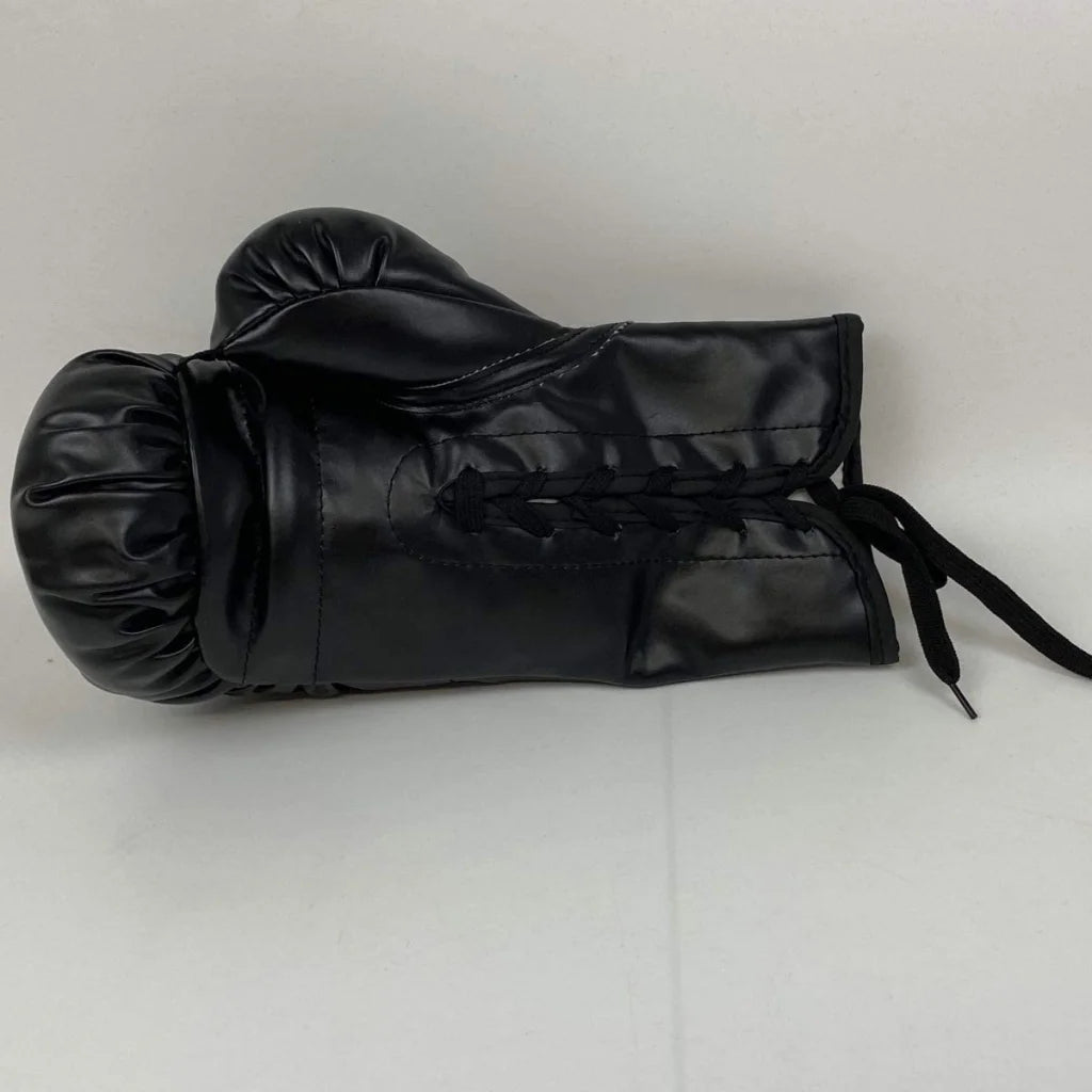 Black lace-up boxing glove with third party authentication for authentic boxing gear