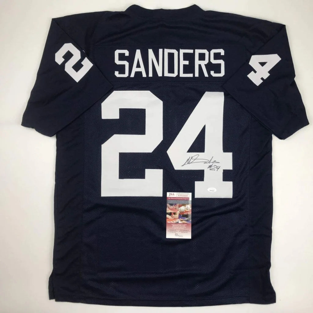 Back of navy blue custom jersey with white number 24 and name sanders signed for professional sports league use