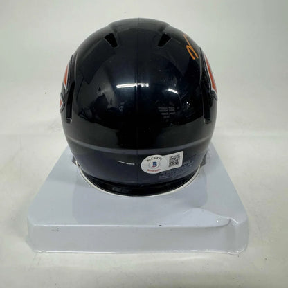 Black football helmet with orange accents for Authentic Chicago Bears Mini Helmet with third party authentication