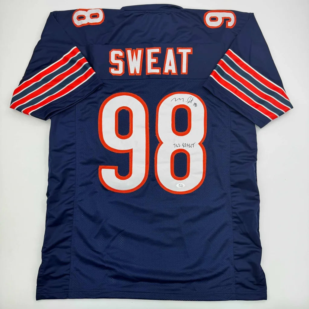 Autographed navy blue custom jersey from a professional sports league with Sweat 98 lettering
