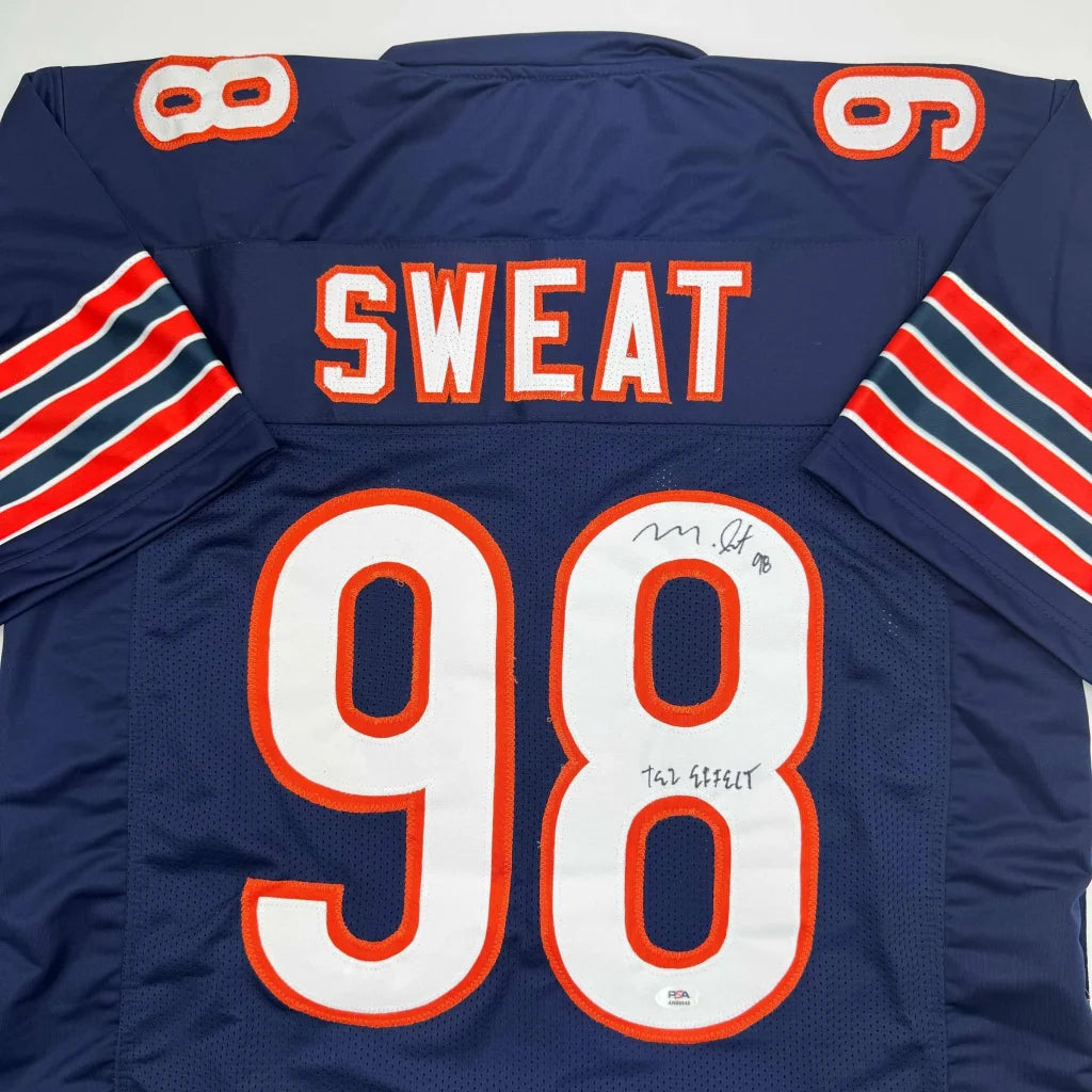 Navy blue custom jersey with white and orange numerals from a professional sports league