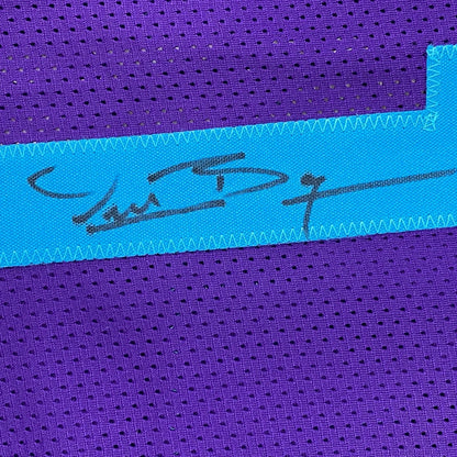 Purple athletic mesh fabric with blue ribbon from Muggsy Bogues signed custom jersey