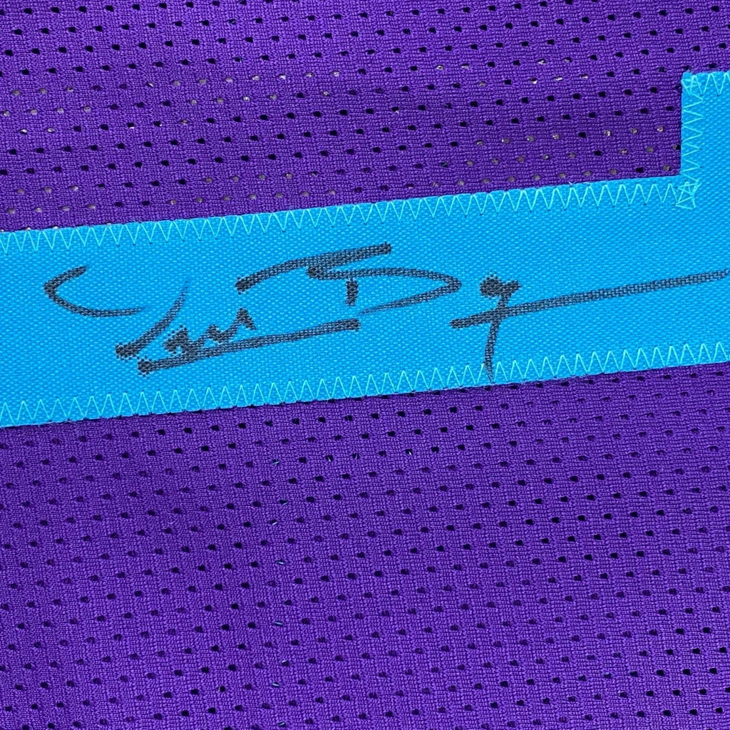 Autographed Muggsy Bogues purple custom jersey with turquoise stripe, Beckett COA