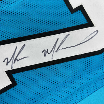 Autographed Muhsin Muhammad custom Carolina Blue mesh jersey with white black stripe, Beckett COA, professional sports league