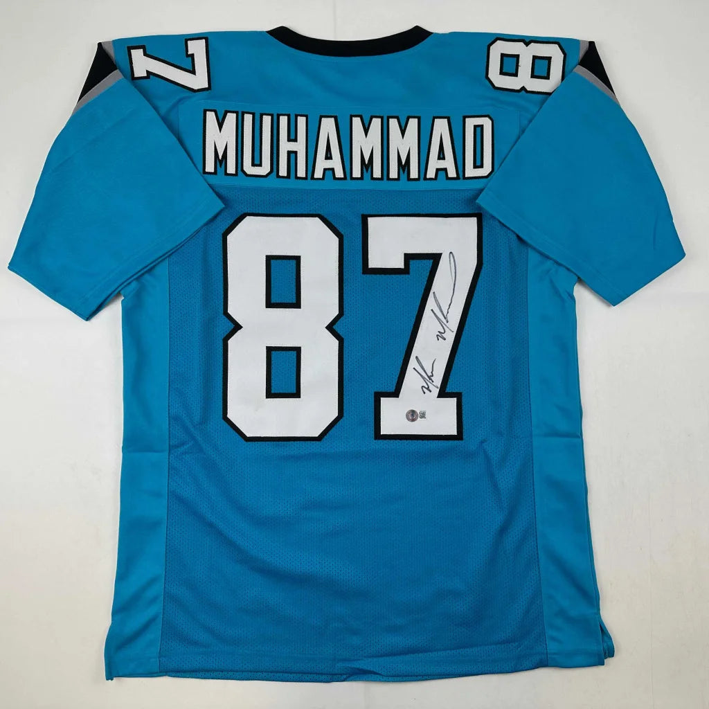 Autographed Muhsin Muhammad Carolina Blue Jersey with number 87 for Carolina fans
