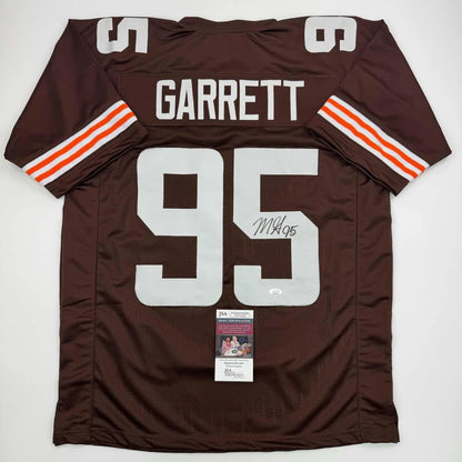 Autographed Myles Garrett Browns jersey with signature, perfect for pro sports fans