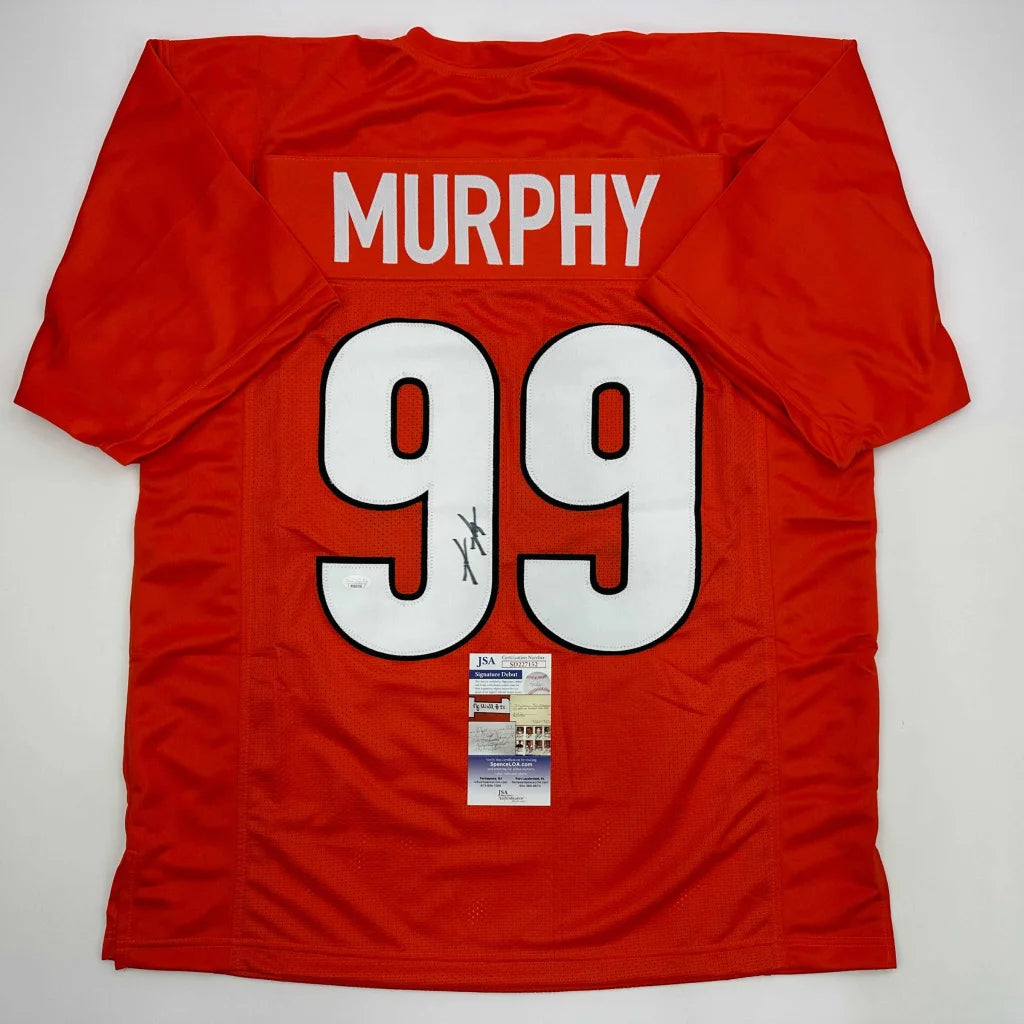 Orange sports jersey with MURPHY 99 signature from a professional sports league collectible