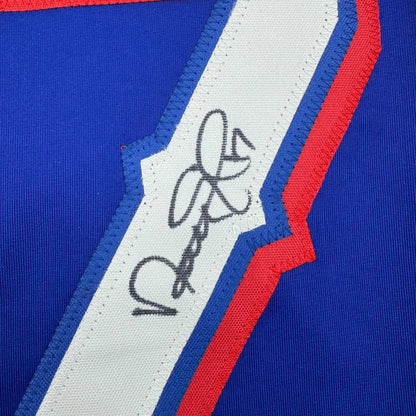 Autographed Nathan Eovaldi custom jersey with black ink signature on royal blue professional sports fabric