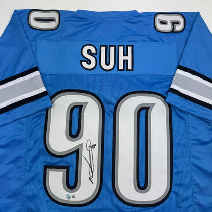 Autographed Ndamukong Suh Detroit Blue Football Jersey Beckett BAS COA | Certified Authentic Signed Memorabilia | vintageantiquesgifts.com