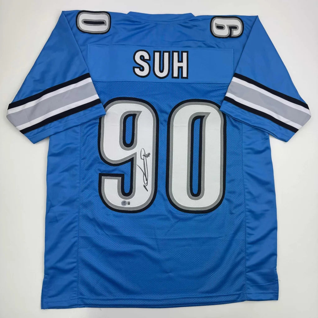 Autographed Ndamukong Suh Detroit Blue Football Jersey Beckett BAS COA | Hall of Fame Sports Memorabilia | vintageantiquesgifts.com