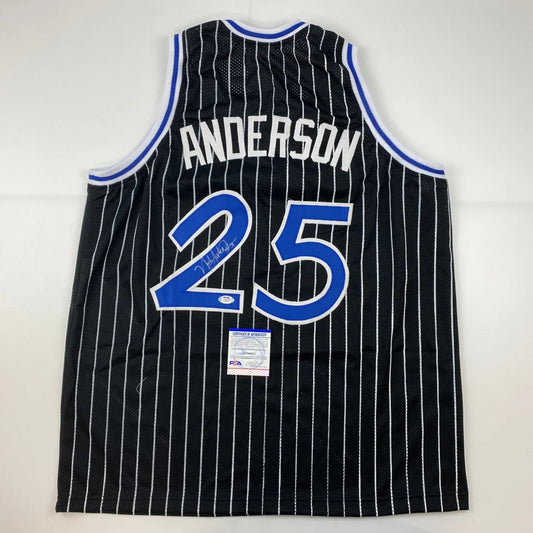 Signed black and white pinstriped Anderson 25 basketball jersey with third party authentication