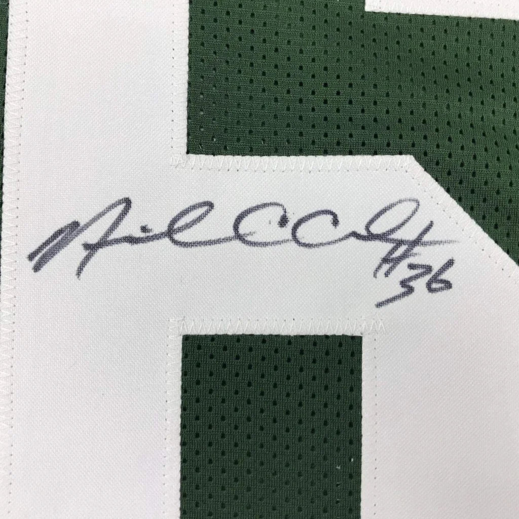 Autographed white and green mesh custom jersey of Nick Collins from professional sports league with PSA DNA COA