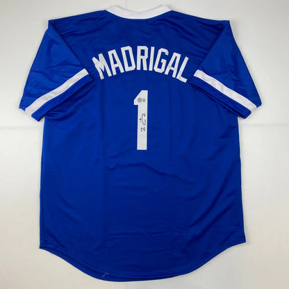Blue custom jersey with MADRIGAL and 1 for professional sports league fans