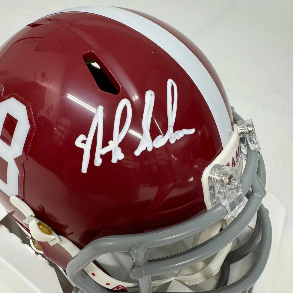 Maroon Alabama Crimson Tide helmet with third party authentication and Nick Saban autograph