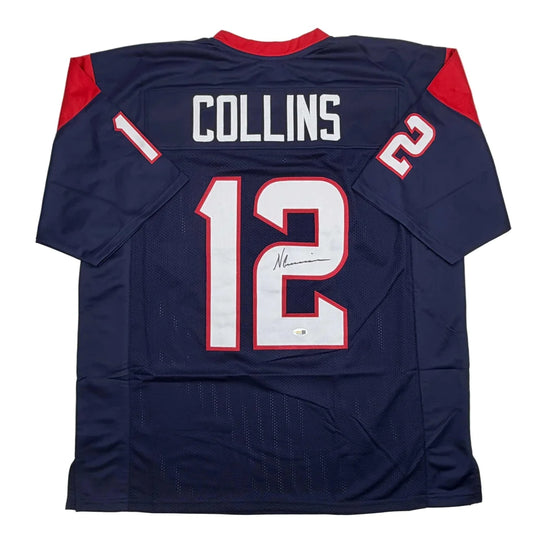 Back view of autographed navy blue and red houston texans custom jersey with white number 12 and name collins from professional sports league