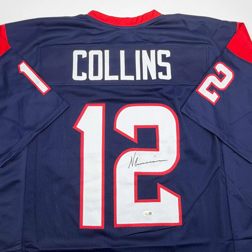 Back of navy blue houston texans custom jersey with red white accents featuring collins 12 in bold for professional sports league