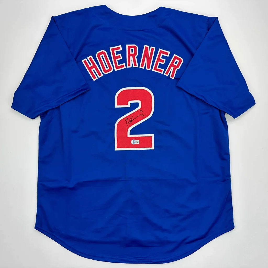 Autographed Nico Hoerner custom Chicago Cubs blue jersey with red Hoerner and number 2