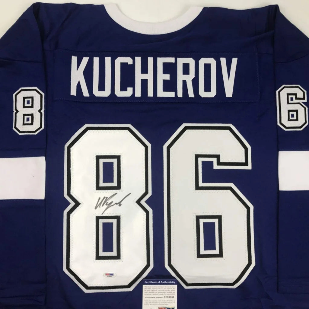 Blue and white custom jersey with number 86 and autograph from a professional sports league