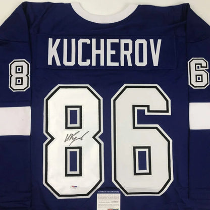 Blue and white custom jersey with number 86 and autograph from a professional sports league