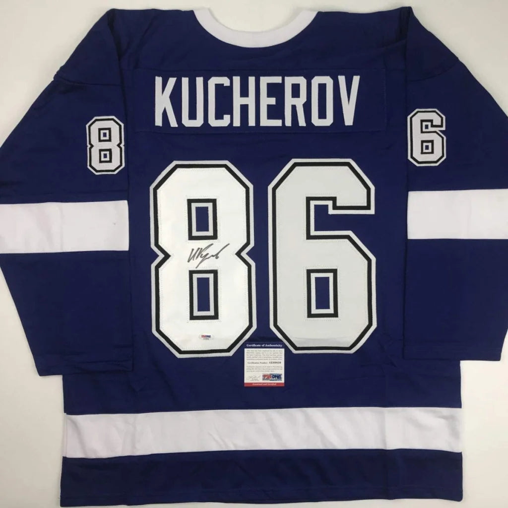 Blue and white custom hockey jersey with number 86 and autograph, perfect for sports fans