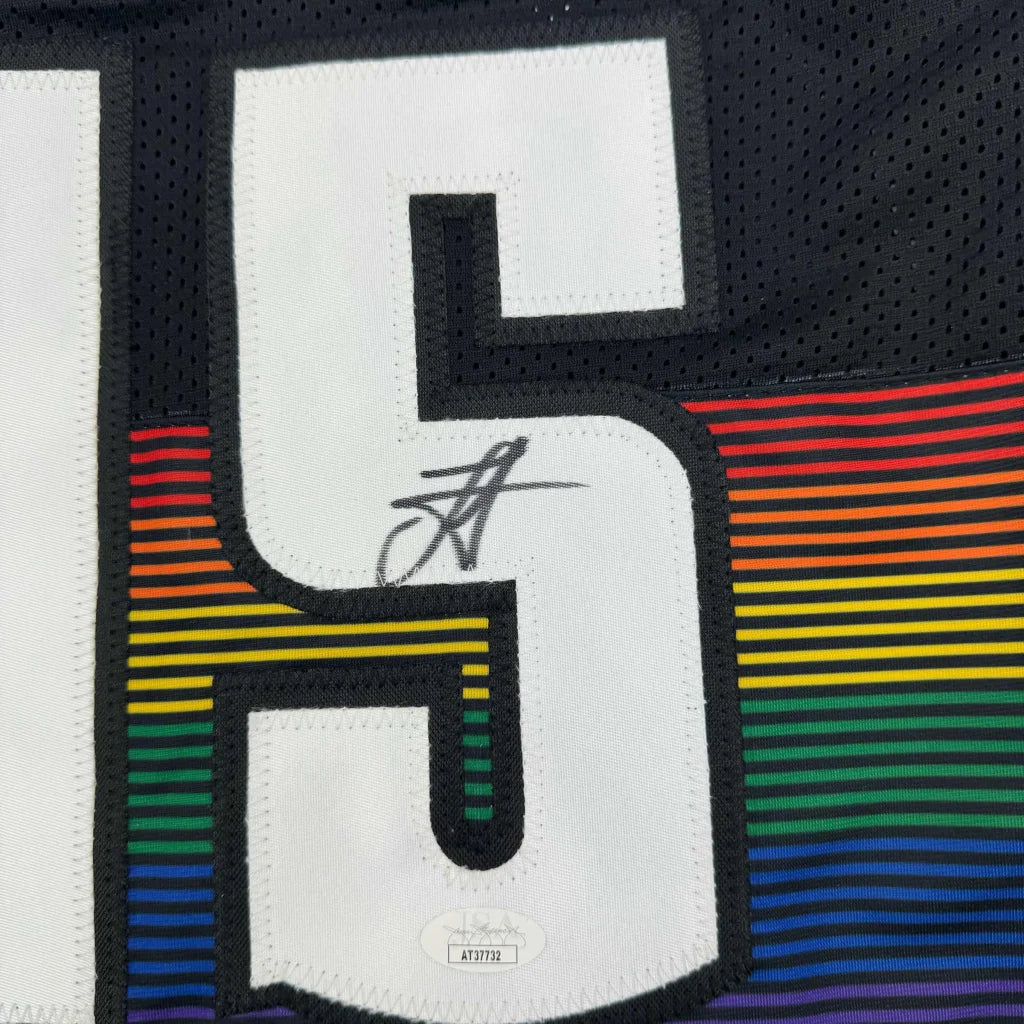 Signed Nikola Jokic Denver Black Rainbow Jersey with white number 5 and rainbow stripes